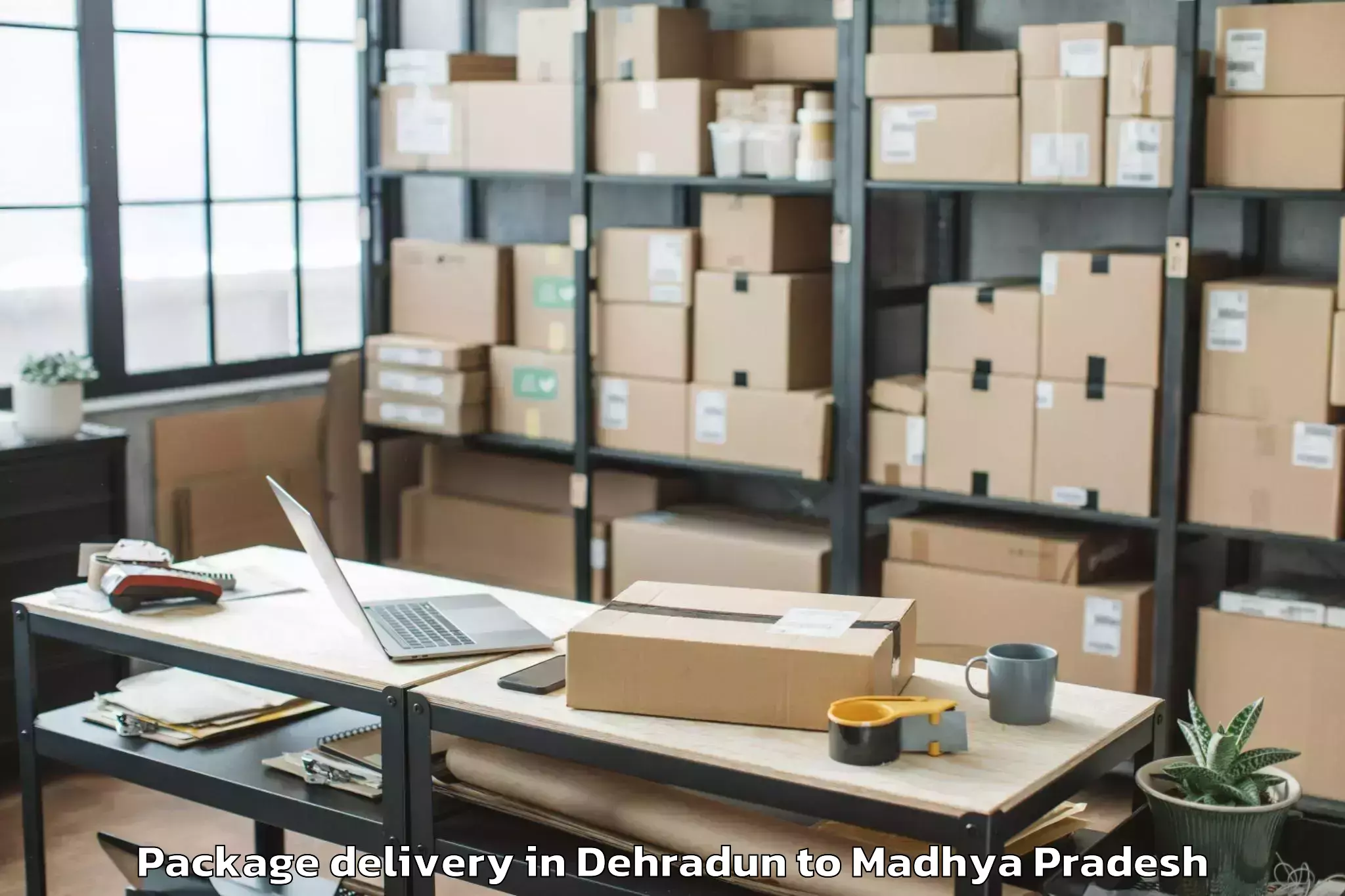 Reliable Dehradun to Shujalpur Package Delivery